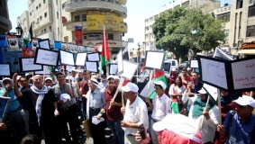 مسيرة للمطالبة باسترداد جثامين الشهداء في رام الله